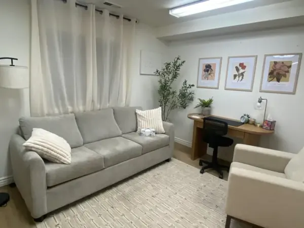Warm, inviting therapy room at Lotus Rose Counseling in Orem, Utah